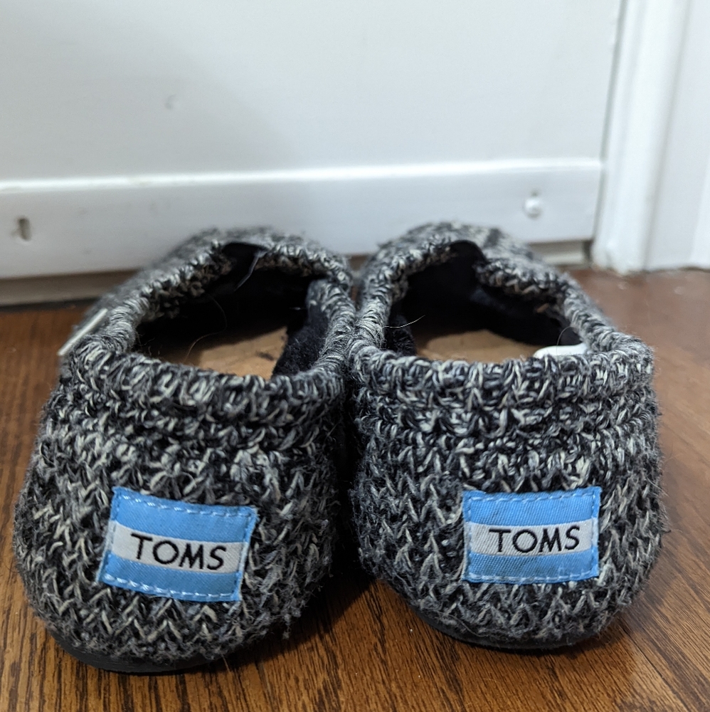Black & White faux fur-lined TOMS, Women's size 5